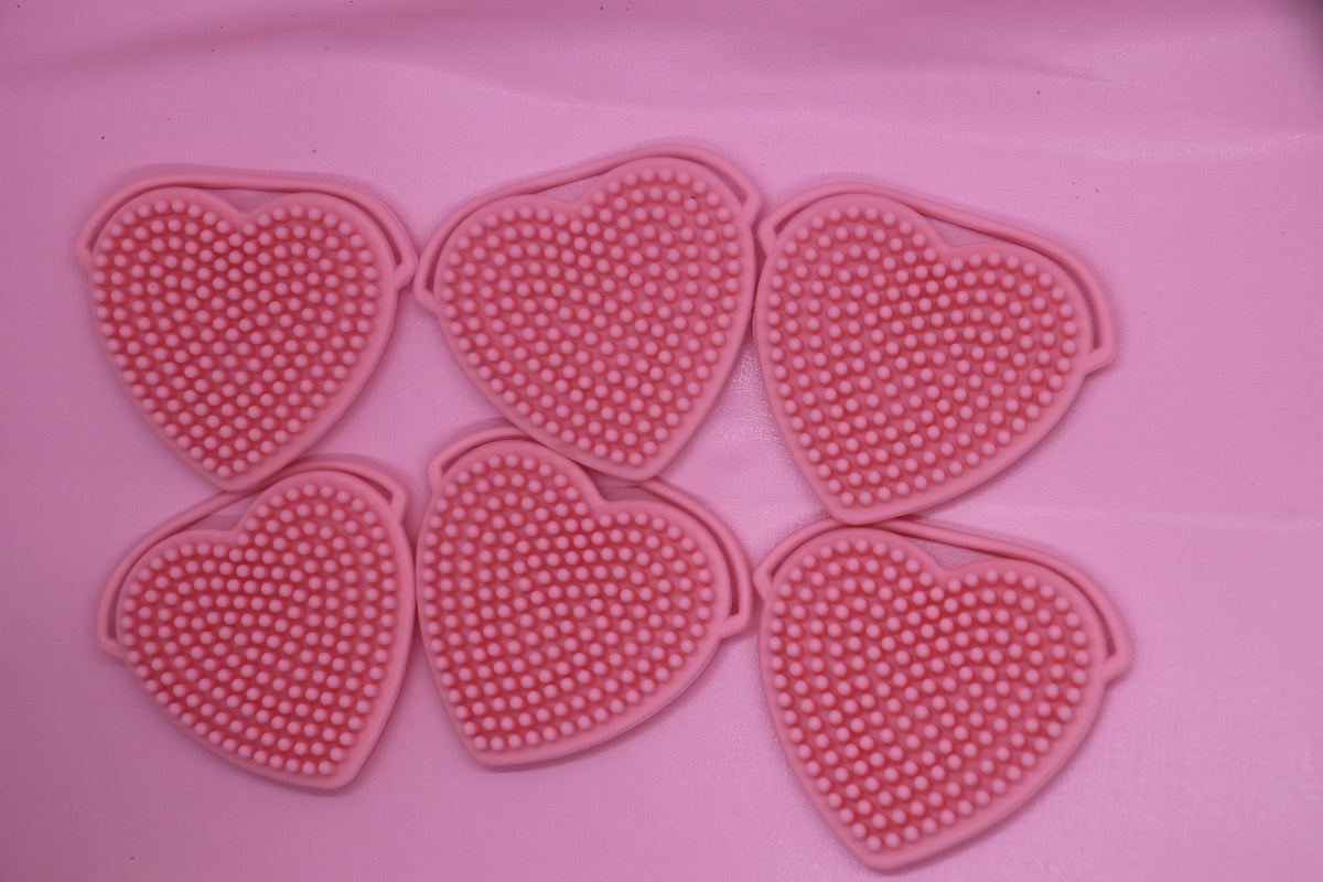 Heart shaped silicon face scrubber